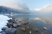 Foggy sunrise at Lake Louise, Banff National Park, UNESCO World Heritage Site, Rocky Mountains, Alberta, Canada, North America