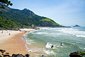 Surfers on Prainha beach, Barra da Tijuca, Rio de Janeiro, Brazil, South America