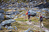 Hikers on the trail during a backpacking trip to Reed Lakes in the Talkeetna Mountains near Palmer, Alaska August 2011.