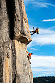 Corey Rich photographs Mitch Underhill on a climb on Lower Phantom Spire, South Lake Tahoe, CA.