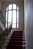 Stairway with wrought iron bannister