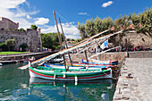 Traditional fishing boats at the port, Chateau Royal Fortress, Collioure, Pyrenees-Orientales, Languedoc-Roussillon, France, Europe