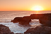 Rock arch at sunrise, Charco Manso Bay, Punta Norte near Echedo, UNESCO biosphere reserve, El Hierro, Canary Islands, Spain, Atlantic, Europe