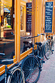 Bicycles outside a cafe in Amsterdam, The Netherlands, Europe