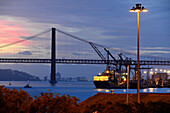 Bridge of 25th of April with harbour, Lisbon, Portugal