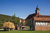 Harvesting display during Museumsfest celebration at Fränkisches Freiluftmuseum Fladungen open air museum