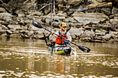Kayak angler paddles in Mineral Wells TX in search of bass