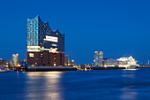 View over the Elbe river to the Elbphilharmonie, cruise liner at Hamburg Cruise Center, Hamburg, Germany