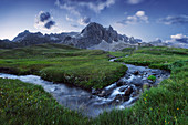 Small stream originating from Lac des Cerces lake, In the background Crete des Rochers Marions mountain, Valloire, France