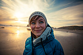 Portrait of a young woman at Bandon Beach.