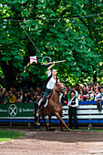 Castelrotto, South Tyrol, Italy. The traditional ring jousting at the Monte Calvario