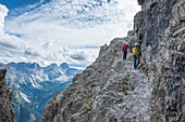 Stubai Alps, Tyrol, Austria. Climbers on the via ferrata of the Ilmspitze.