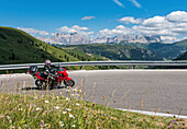 Arabba, Dolomites, Veneto, Italy. Motorbike on the road to Passo Pordoi