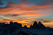Picco di VallandroDuerrenstein, Dolomites, South Tyrol, Italy. Sunrise over the Tre Cime di Lavaredo in the Dolomites