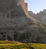 Sesto Dolomites, Veneto, Italy. Hikers on the path 117 Bonacossa