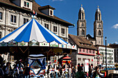 Carousel on Rathausbrücke and Grossmünster Church, Zurich, Switzerland