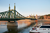 View at the bridge Freiheitsbrücke (Szabadsag hid) and to Gellért Baths and Hotel , Budapest , River Danube , Hungary , Europe