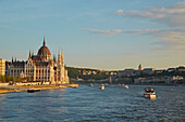 Budapest , Houses of Parliament at Pest , River Danube , Hungary , Europe