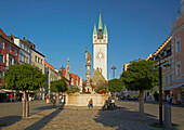 Theresienplatz and Stadtturm and Baroque well at Straubing , Bavaria , Germany , Europe