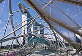 Singapore, Marina Bay Sands Hotel with Skypark seen from the Helix Bridge.