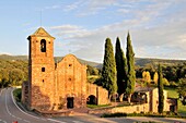 'Church of Sant Martí del Brull, located in the center of the town of El Brull; it is an 11th century Romanesque building well conserved outside, the bell tower and the West gate are from the 18th. Osona, Barcelona province, Catalonia, Spain'