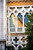 Typical gothic arches and windows, palace facade, Palazzo Franchetti, Venice, Venetia, Italy.