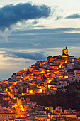 The White Town of Arcos de la Frontera on a limestone rock at dawn. Arcos de la Frontera, Cádiz province, Andalusia, Spain.