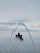 Notorious multimedia water display of the Fountain of Montjuic by the day, Barcelona, Spain.