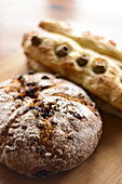 Homemade breads including steccas and carrot bread.