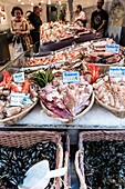 Seafood at Market of Rue Mouffetard street in Paris, France.