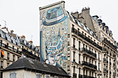 Painted facade, near Gare du Nord, Paris, Ile-de-France, France
