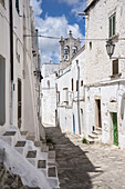 Medieval whitewashed streets of Ostuni, Puglia, Italy.