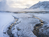 Geothermal area Hveraroend near lake Myvatn and the ring road during winter with mud pools , fumaroles and solfataras. europe, northern europe, scandinavia, iceland, February.