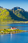 Red church on Austnesfjord, Lofoten Islands, Norway.