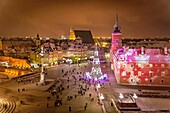 Christmas illumination of Castle Square with Sigismund´s Column, Christmas tree and Royal Castle in the Old Town of Warsaw, Poland.