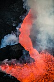 Aerial view of lava and plumes. August 29, 2014 a fissure eruption started in Holuhraun at the northern end of a magma intrusion, which had moved progressively north, from the Bardarbunga volcano. Bardarbunga is a stratovolcano located under Vatnajokull, 