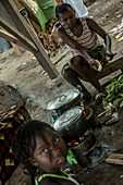 Locals cooking a meal, Sao Tome, Sao Tome and Principe, Africa