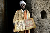 Priest with anceint religious relics. Asheton Maryam Monastery. Lalibela. Ethiopia.
