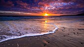 Sunset over the Channel Islands from Ventura State Beach, Ventura, California USA.