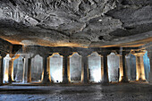 Cave No 4: Main hall. Plain octagonal pillars and simple pillar capitals. Ajanta Caves, Aurangabad, Maharashtra, India.