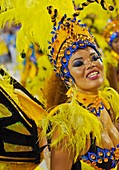 Brazil, State of Rio de Janeiro, City of Rio de Janeiro, Samba Dancer in the Carnival Parade at The Sambadrome Marques de Sapucai..