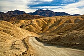 Dirt road through Twenty Mule Team Canyon, Death Valley National Park, California.