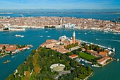 Italy, Venice lagoon, San Giorgio Maggiore and back Venice city (aerial view).