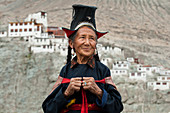 A Nubra woman wears traditional dress to attend a gathering at a local monastery in the Nubra Valley, Ladakh, India, Asia