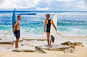 Surfers on a beach