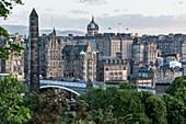 'New Town and pedestrians walking on a bridge; Edinburgh, Scotland'