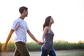 Couple taking walk together outdoors