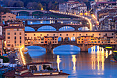 Europe, Italy, Tuscany. Ponte Vecchio in the center of Florence by night