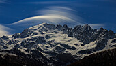 Europe, Italy, Lombardy, Valtellina. Cima Piazzi nightscape during a full moon night