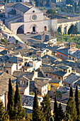 Italy, Umbria, Assisi, Santa Chiara Basilica listed as World Heritage by UNESCO, facade seen from the top of the Rocca Maggiore Fortress